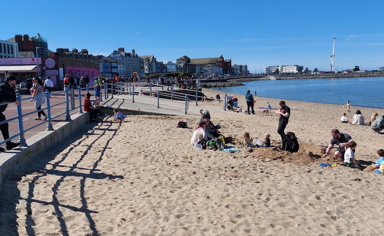 Photo of Morecambe Beach with bright sand surface