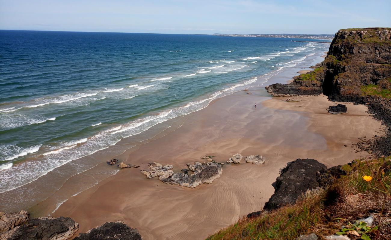 Photo of Downhill Beach with bright fine sand surface