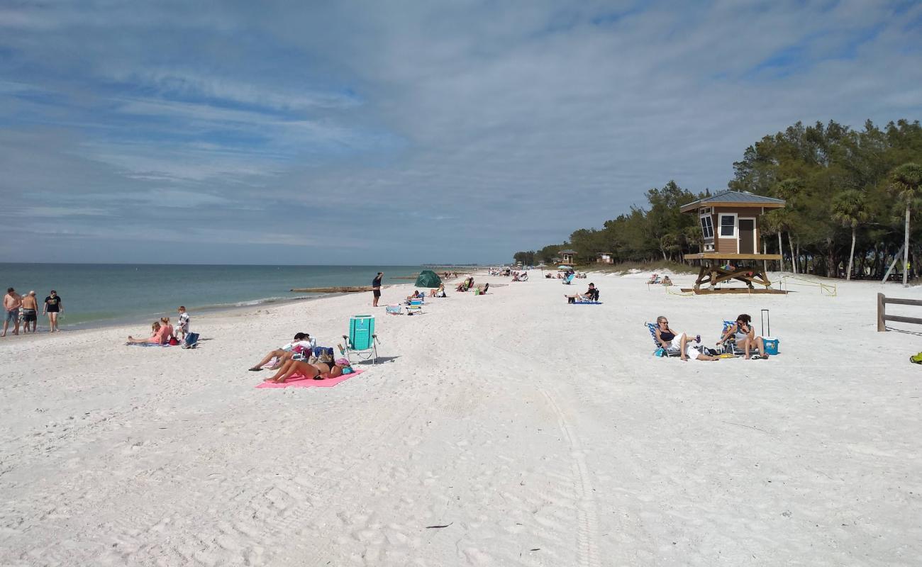 Photo of Coquina beach with white sand surface