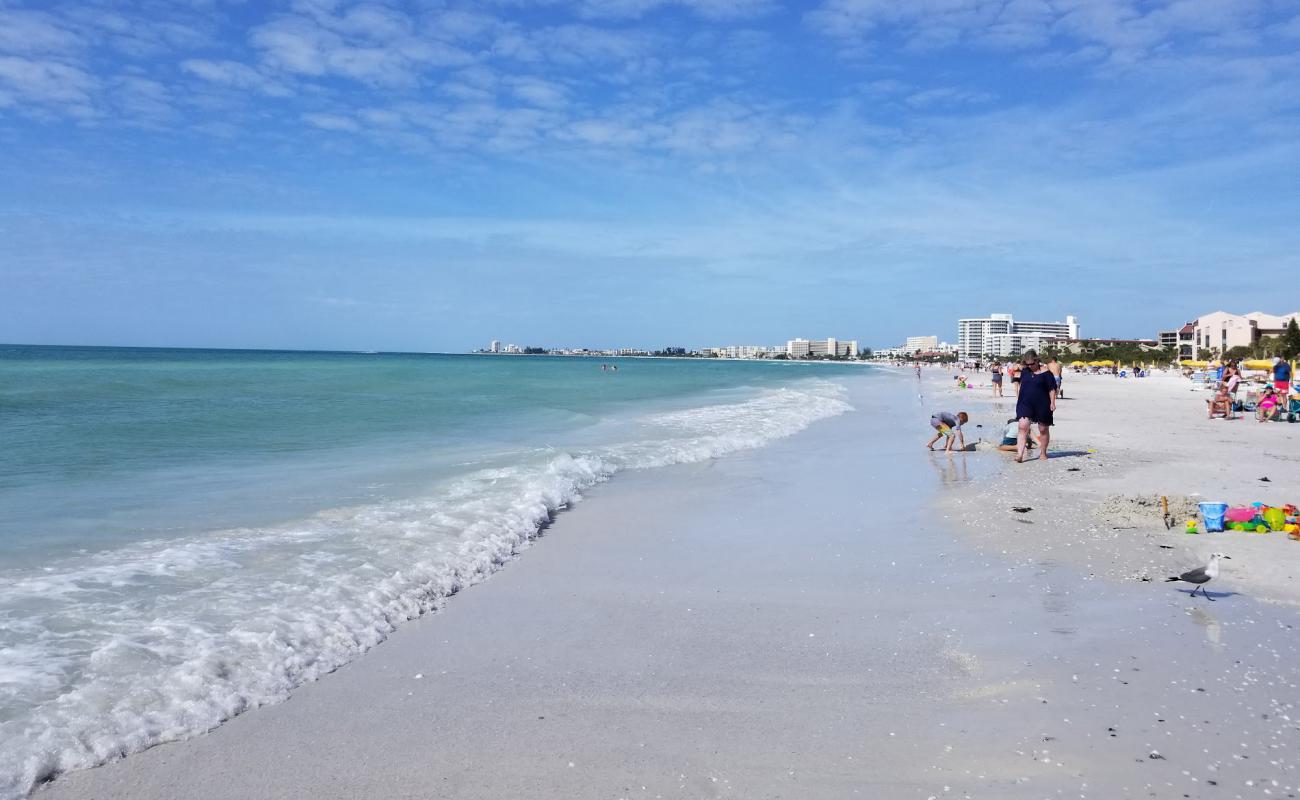 Photo of Crescent beach with white sand surface