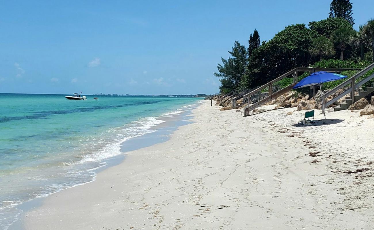 Photo of Gulf Surf beach with bright shell sand surface