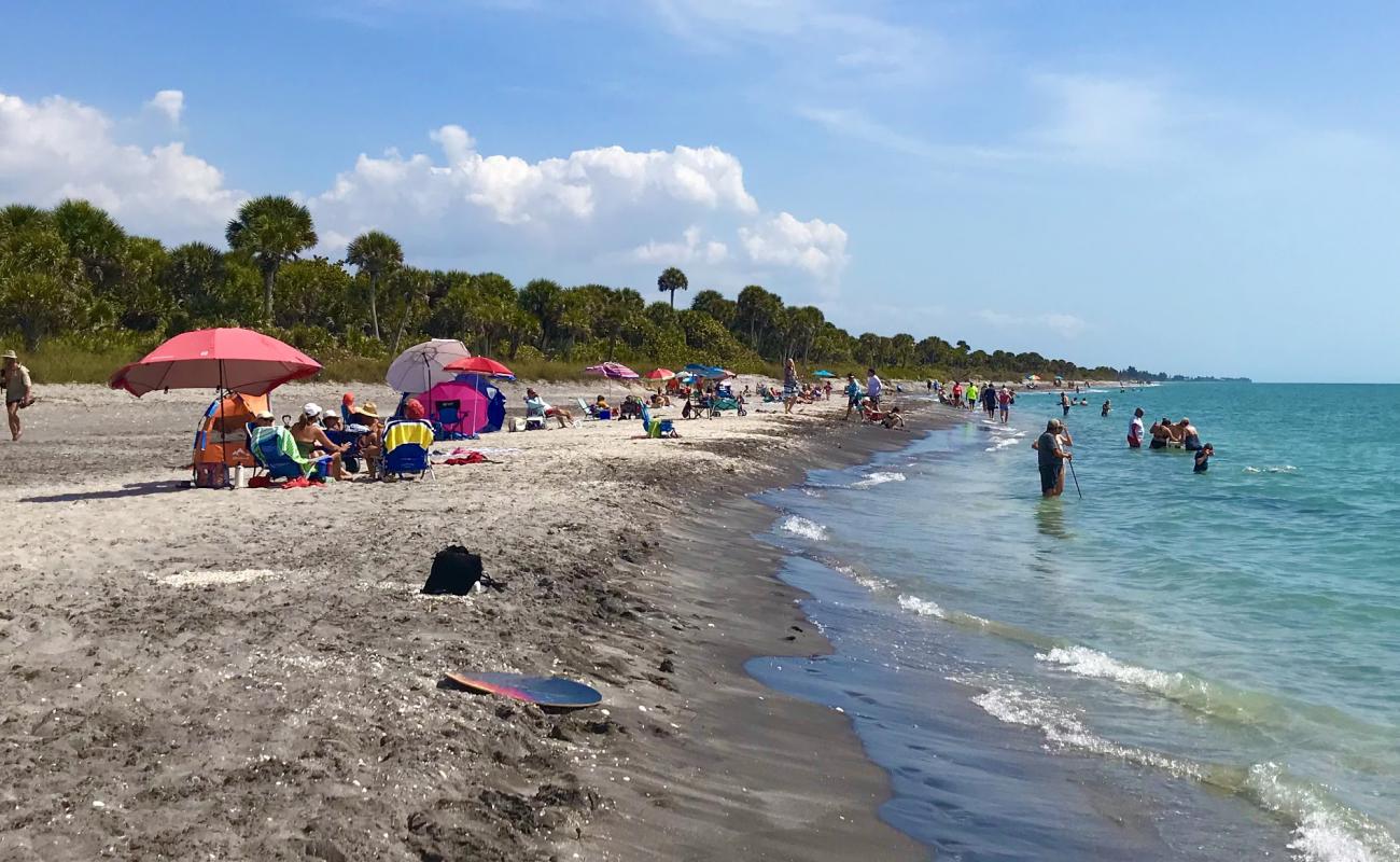 Photo of Caspersen beach with gray sand &  rocks surface