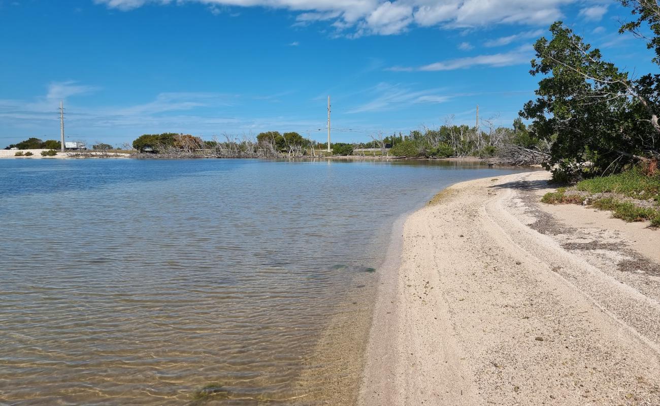 Photo of Camp Wesumkee beach with gray sand &  rocks surface