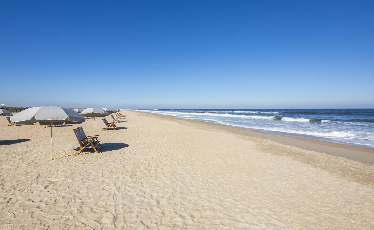 Photo of St. Johns Pier beach with bright shell sand surface