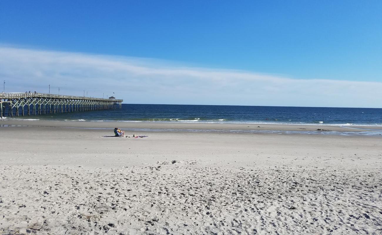 Photo of Long beach with bright fine sand surface