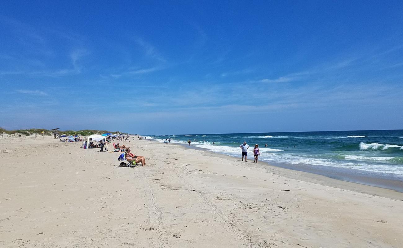 Photo of Coquina beach with bright sand surface