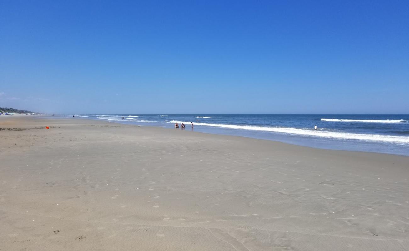 Photo of Corolla beach with bright sand surface