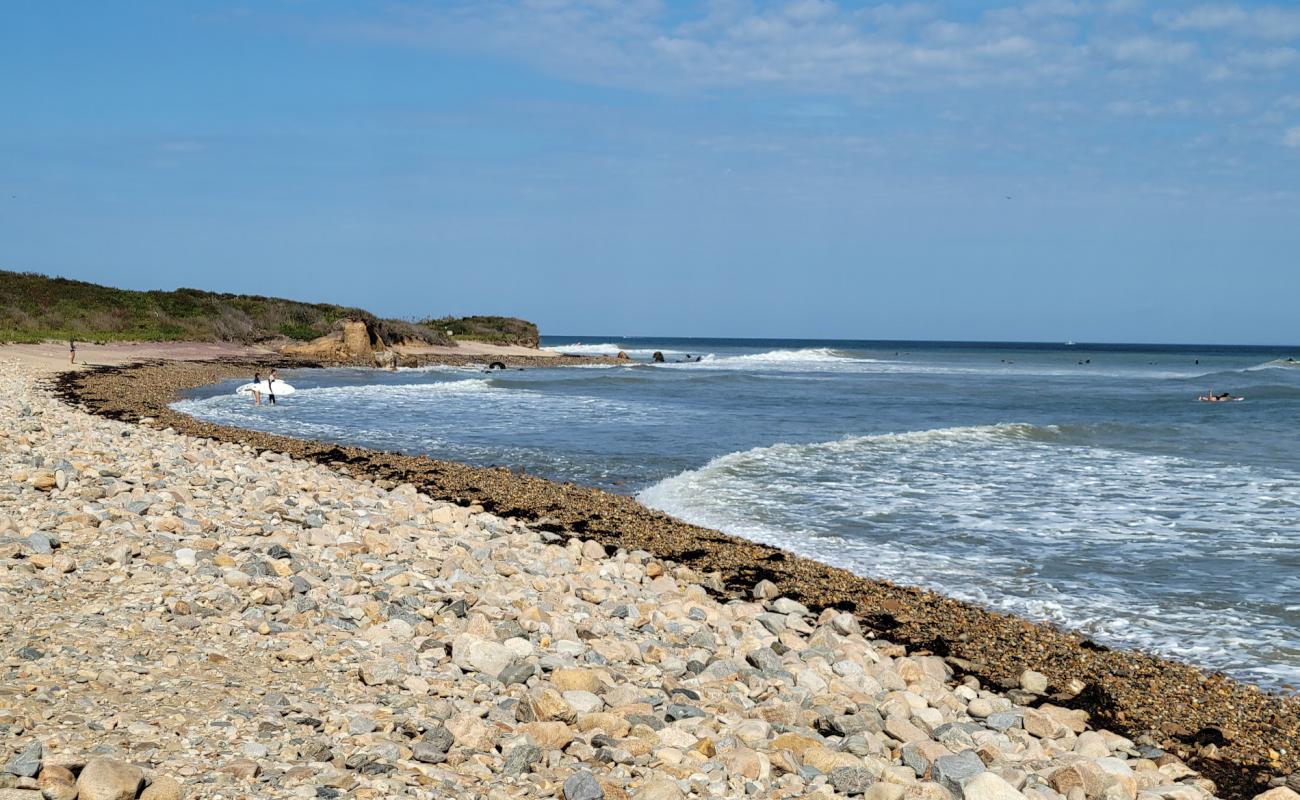 Photo of Montauk Lighthouse with light fine pebble surface