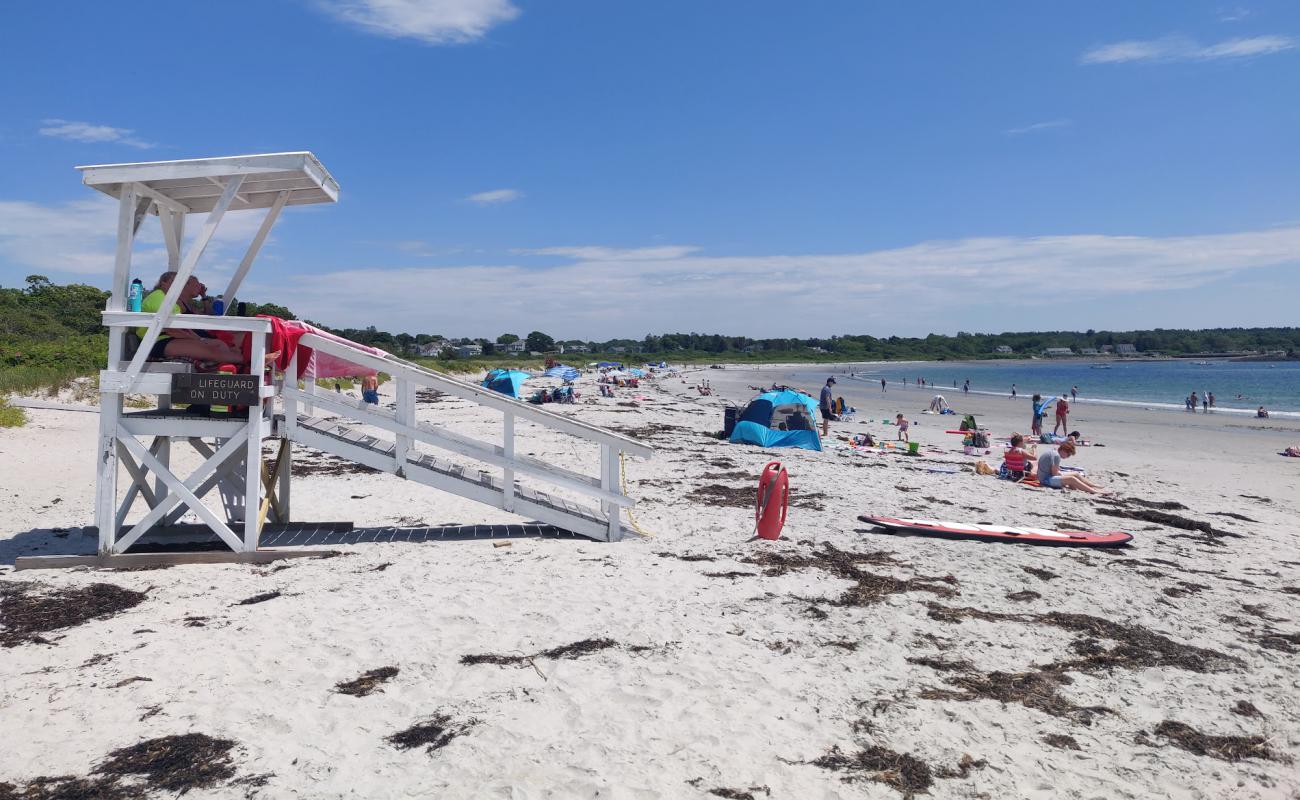 Photo of Crescent beach with bright sand surface