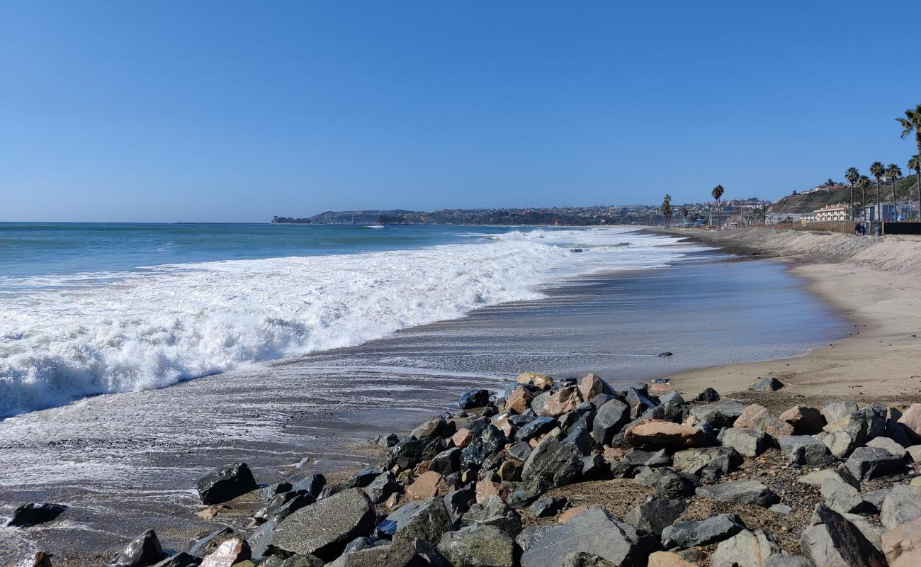 Photo of Capistrano beach with light sand &  pebble surface