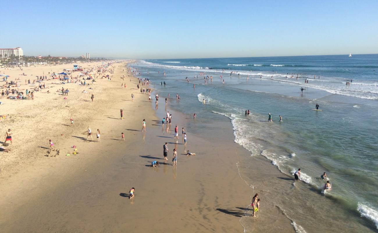 Photo of Huntington Beach with bright sand surface