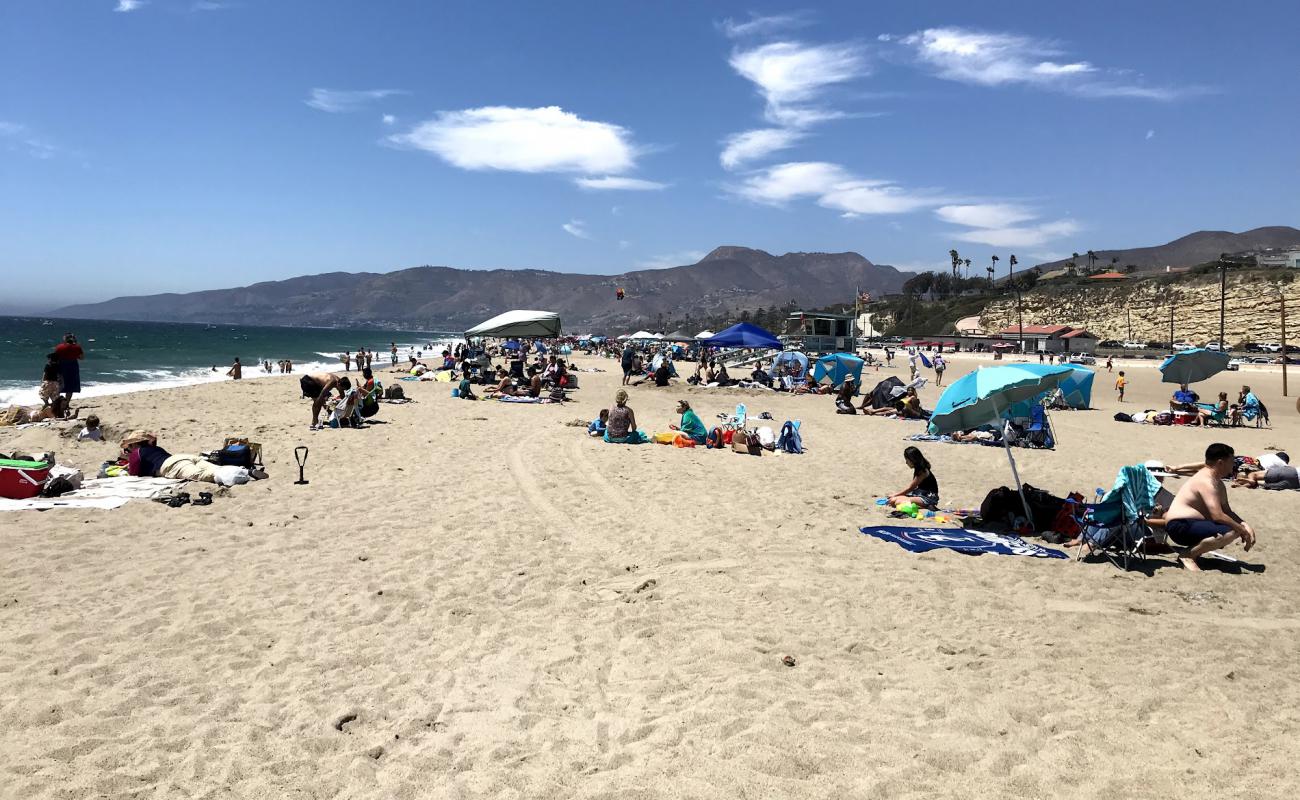 Photo of Zuma Beach with bright fine sand surface