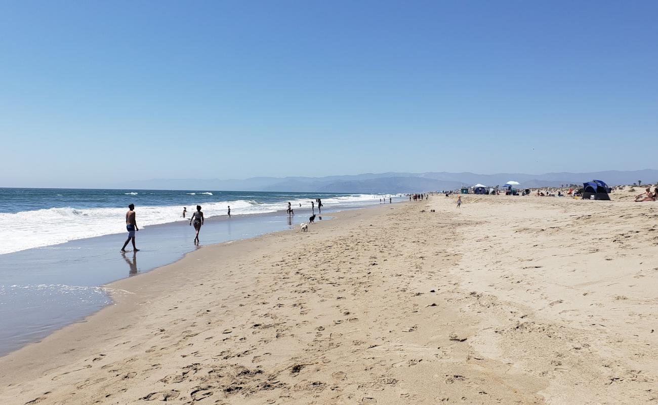 Photo of Oxnard Beach with bright sand surface