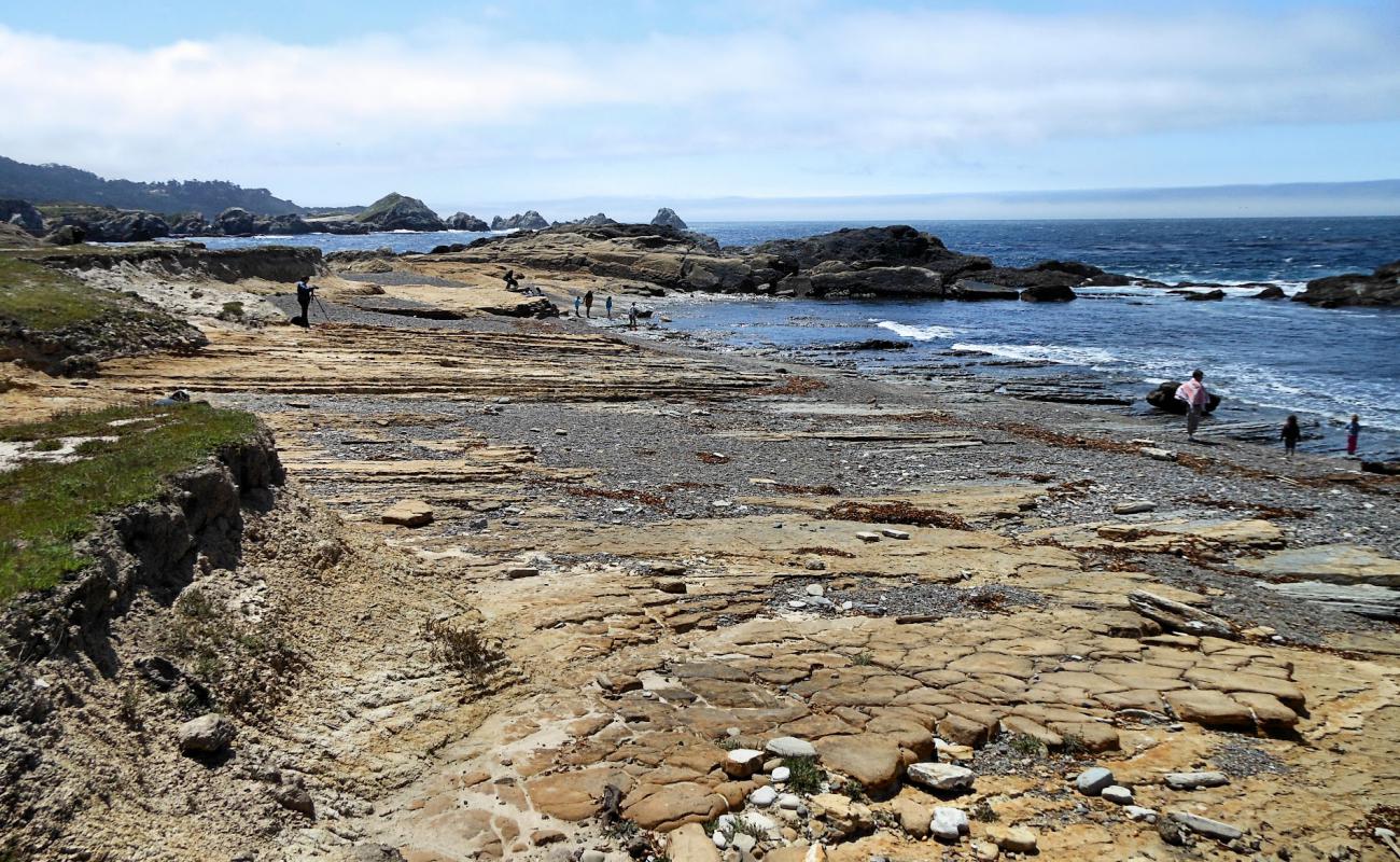 Photo of Weston Beach Point with gray sand &  rocks surface