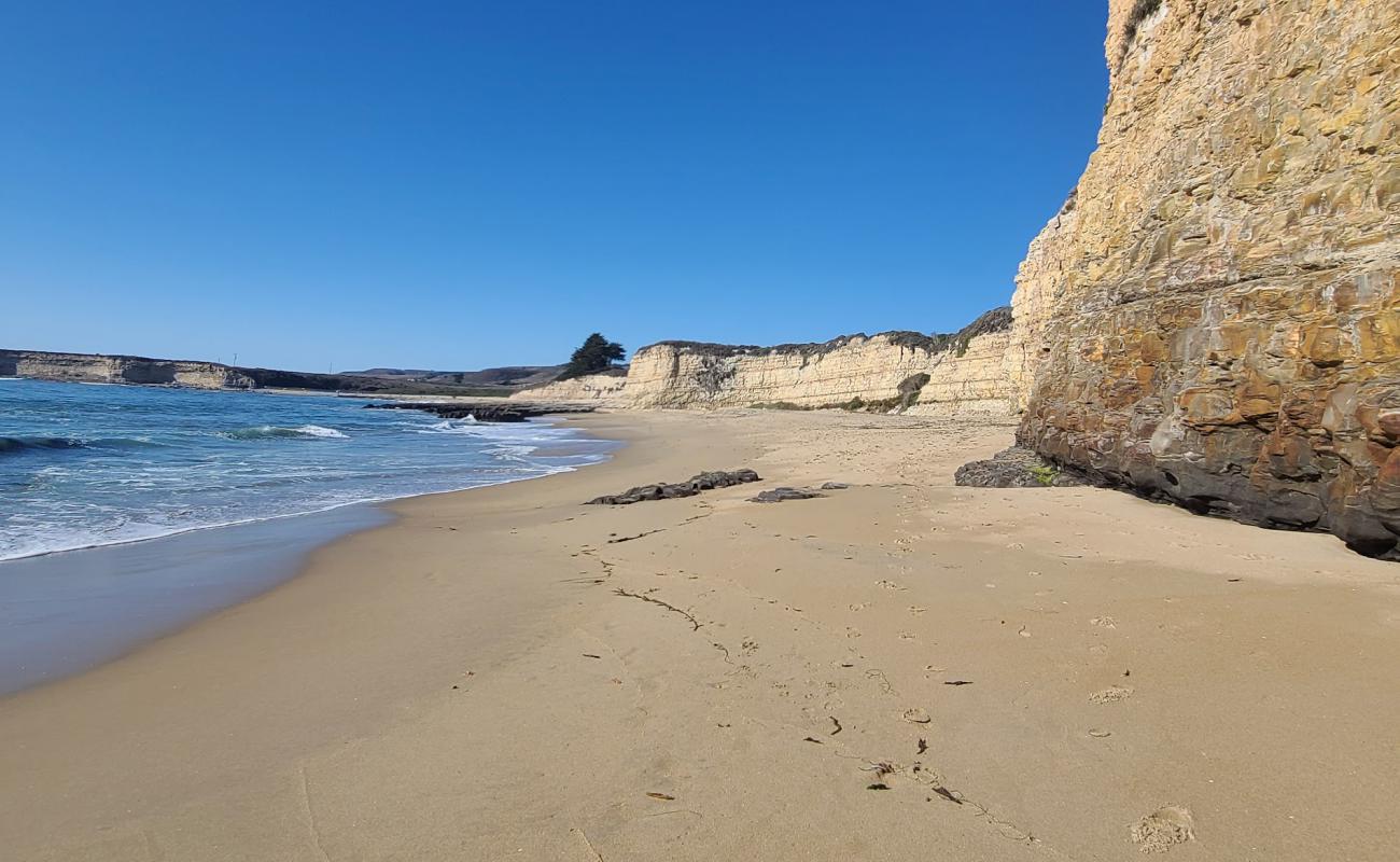 Photo of Four Mile Beach with bright fine sand surface