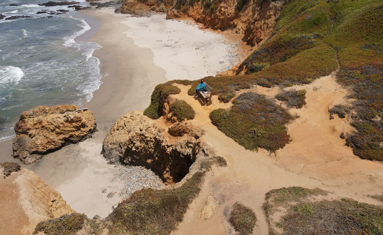 Photo of Pescadero Beach with bright sand & rocks surface