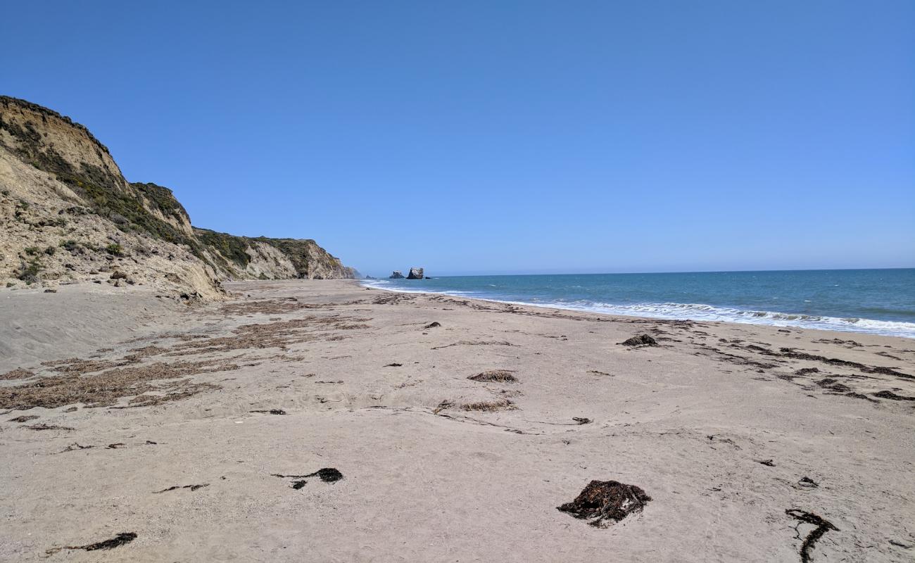 Photo of Kelham Beach with bright sand surface