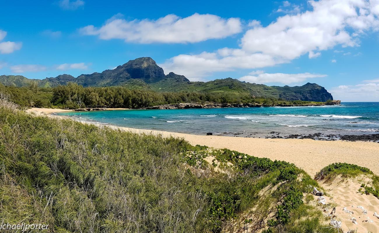 Photo of Mahaulepu Beach with gray sand surface