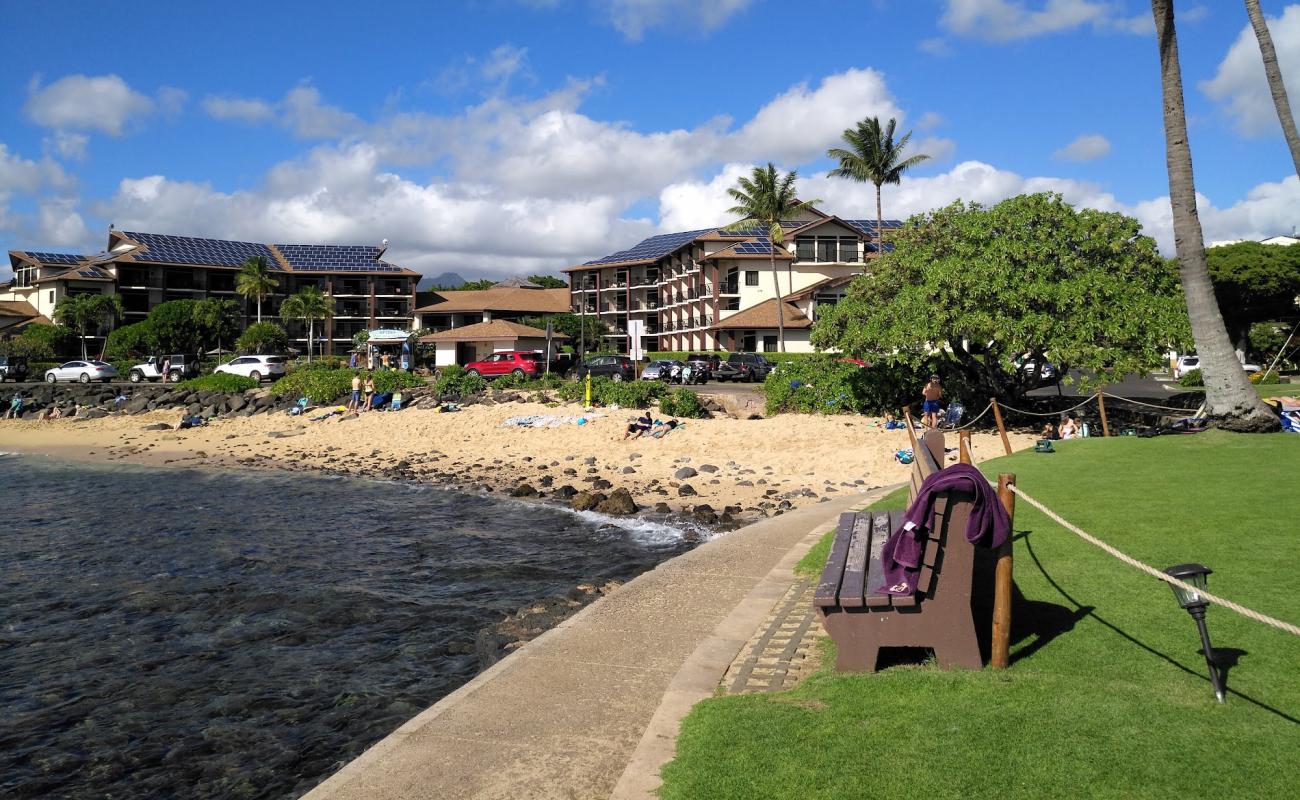 Photo of Lawa'i Beach with bright sand & rocks surface