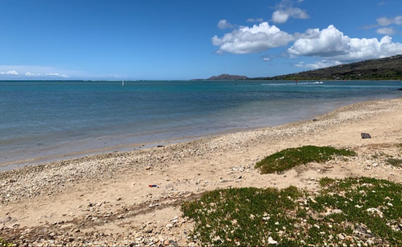 Photo of Maunalua Bay Beach with bright sand & rocks surface