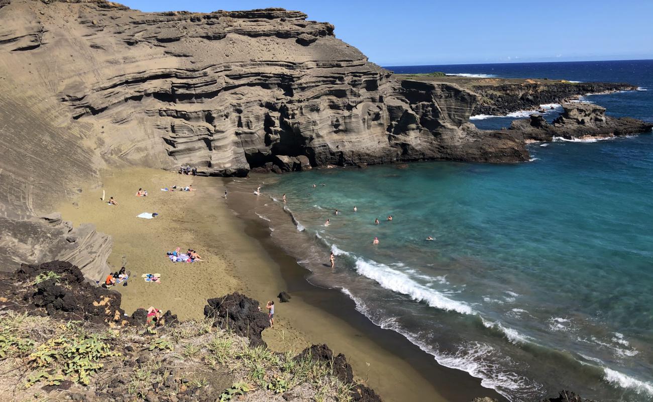 Photo of Green sand beach with bright sand surface