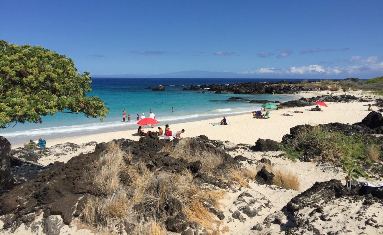 Photo of Makalawena Beach with bright fine sand surface