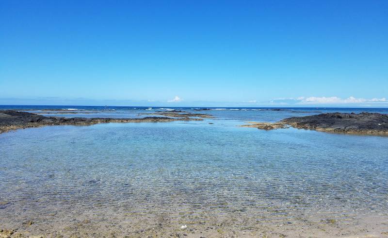 Photo of Mauna Lani Beach with bright sand surface