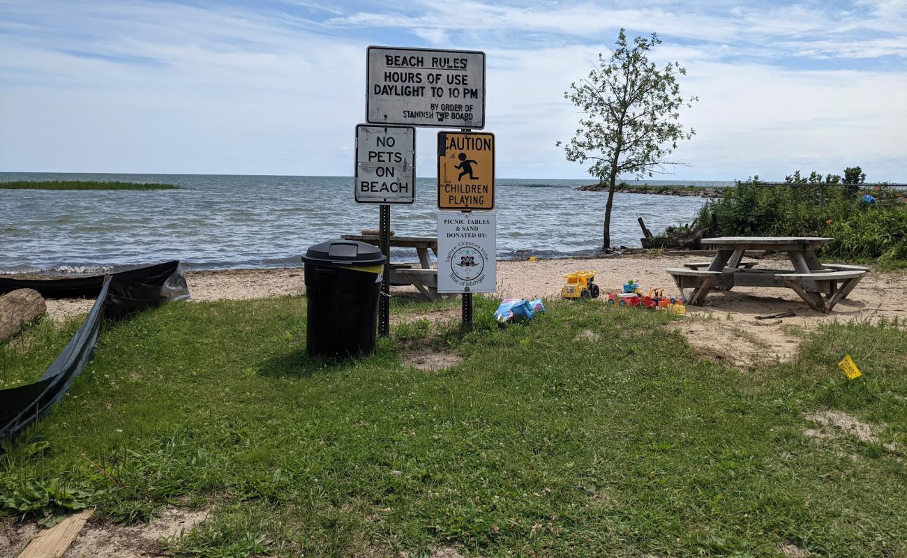 Photo of Whites beach with bright sand surface