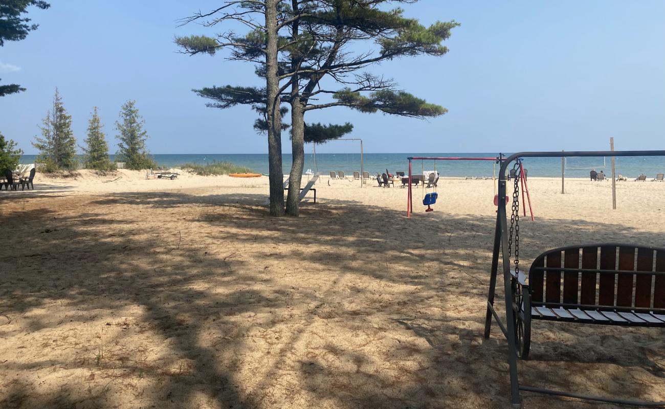 Photo of Cedar lake resort area with bright sand surface