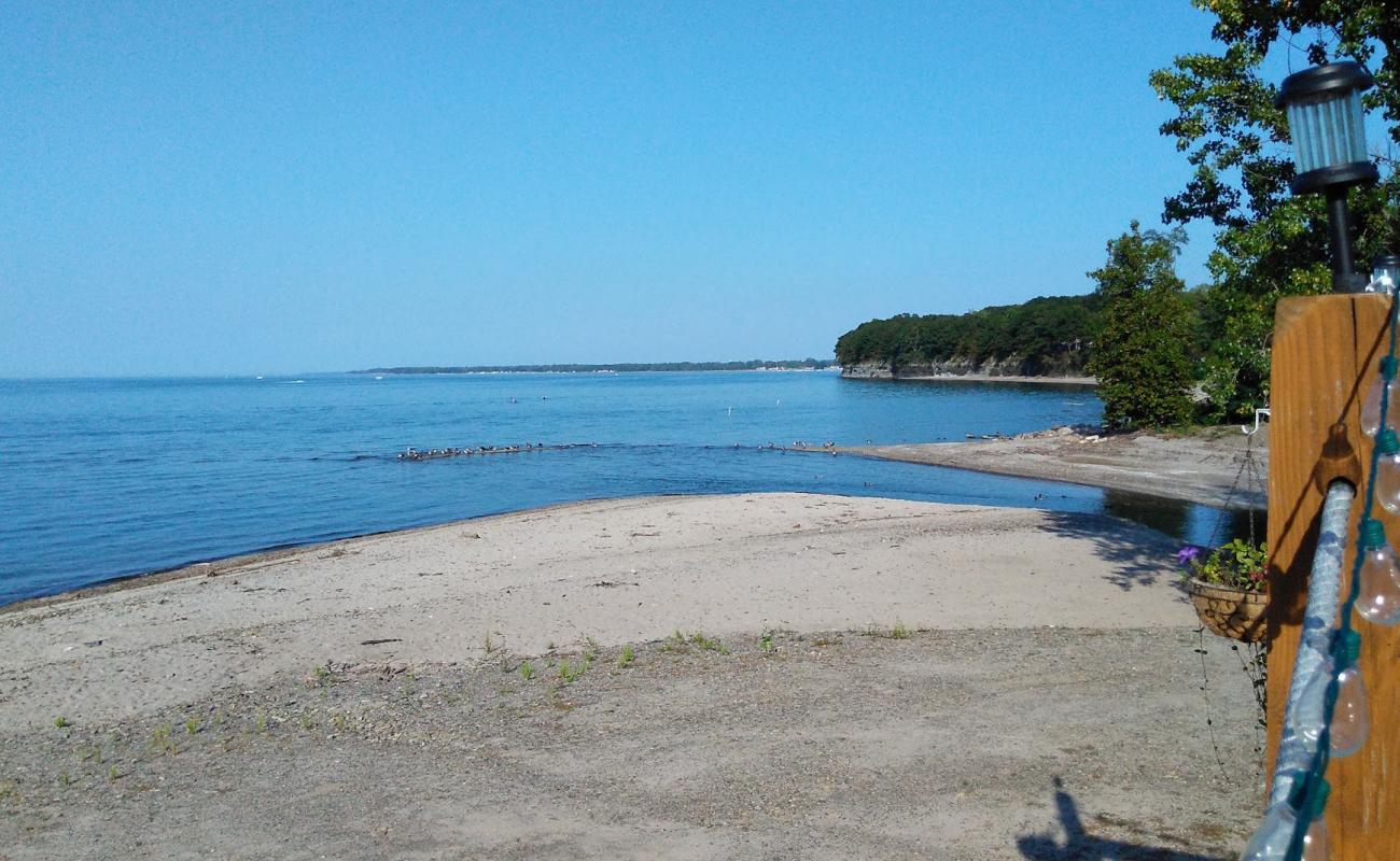 Photo of Silver Creek Firemen's Beach with bright sand & rocks surface