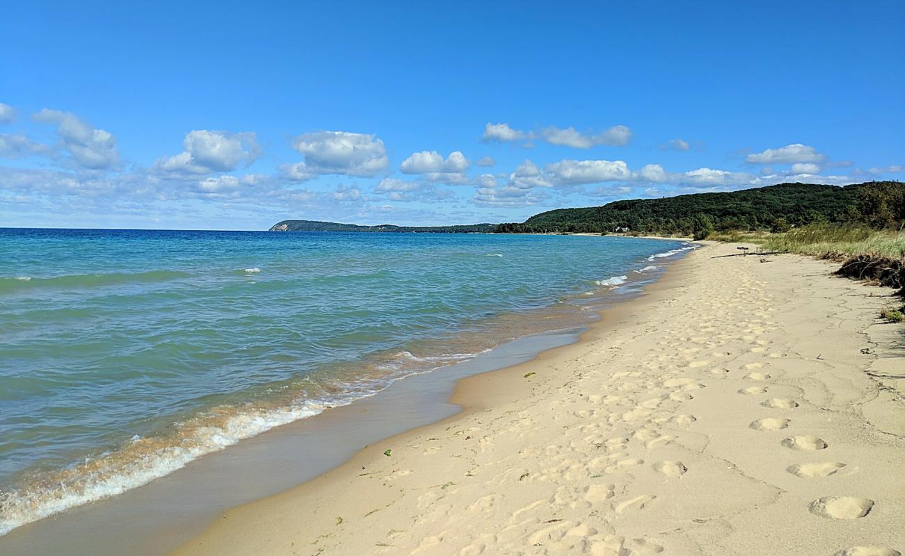 Photo of Good Harbor Bay Beach with bright sand surface