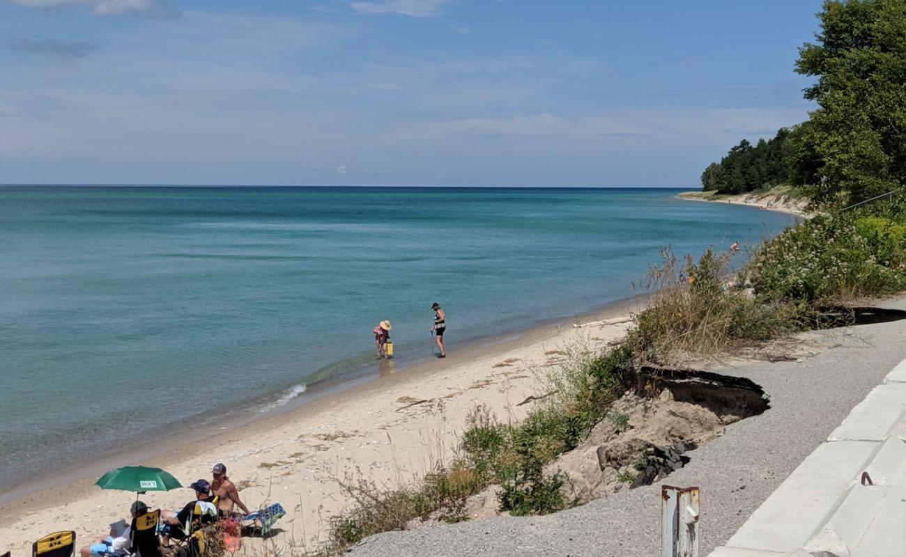 Photo of Christmas Cove Beach with light sand &  pebble surface