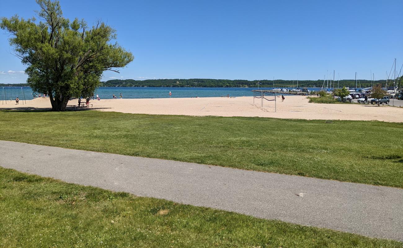 Photo of Suttons Bay Beach with bright sand surface