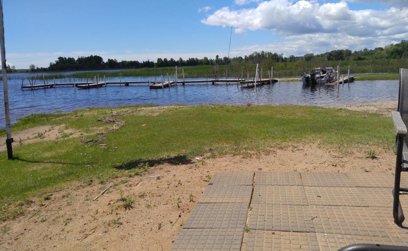 Photo of Brock's Lakeshore Cabins with bright sand surface