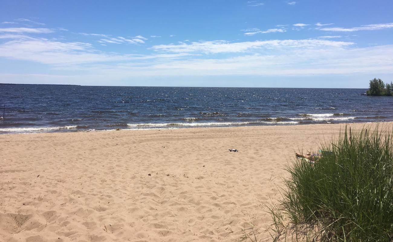 Photo of Escanaba Municipal Beach with bright sand surface