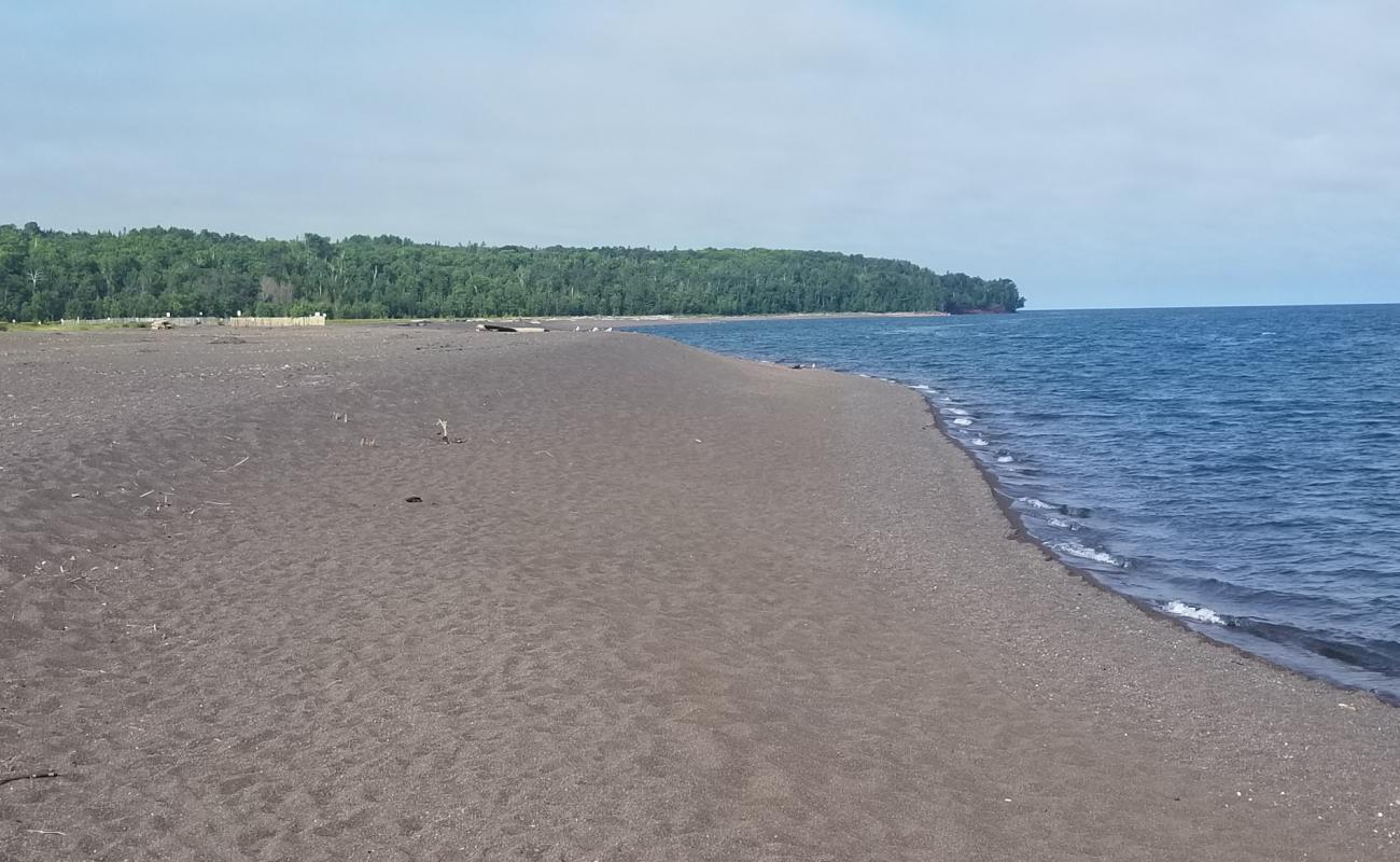 Photo of Breakers Beach with gray sand surface