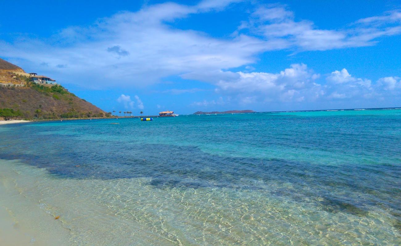 Photo of Oil Nut Bay beach with bright fine sand surface