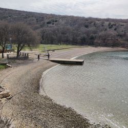 Photo of Konobe beach with turquoise pure water surface