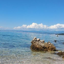 Photo of Njivice small beaches with turquoise pure water surface