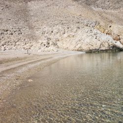 Photo of Baska slana beach with turquoise pure water surface