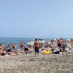 Photo of Batumi beach with turquoise water surface