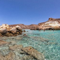 Photo of Dei Conigli Beach with turquoise pure water surface