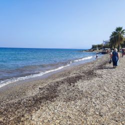 Photo of Guzelcamli beach and the settlement